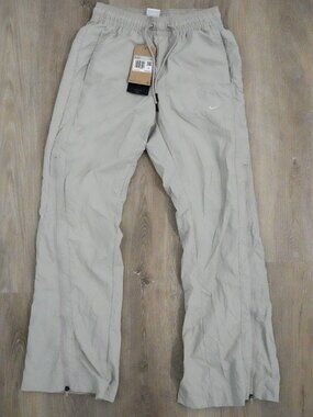 Nike Women's Woven Pants Tan Khaki Ankle Zip Drawstring XS NWT $110